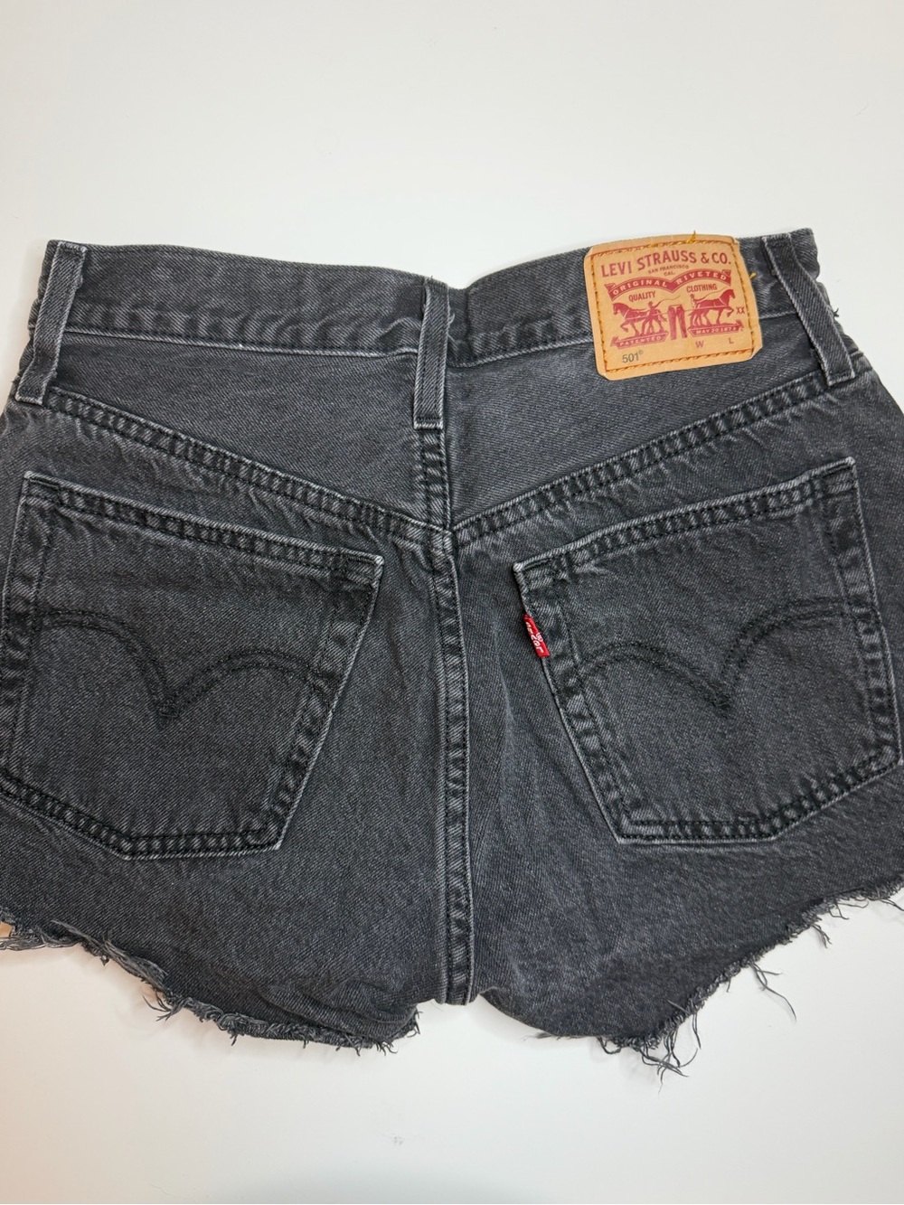 Levi's Washed Black Denim Cutoff Shorts